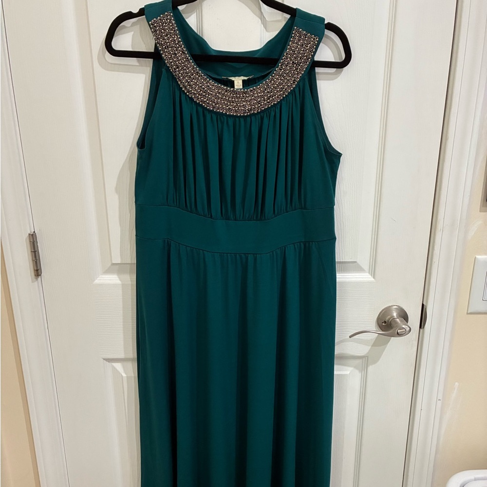 Elegant Teal Sleeveless Dress with Embellished Neckline